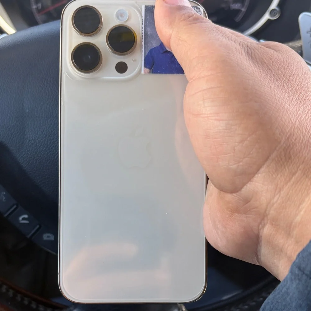 Apple Smartphone with Black Display and Gold Edges